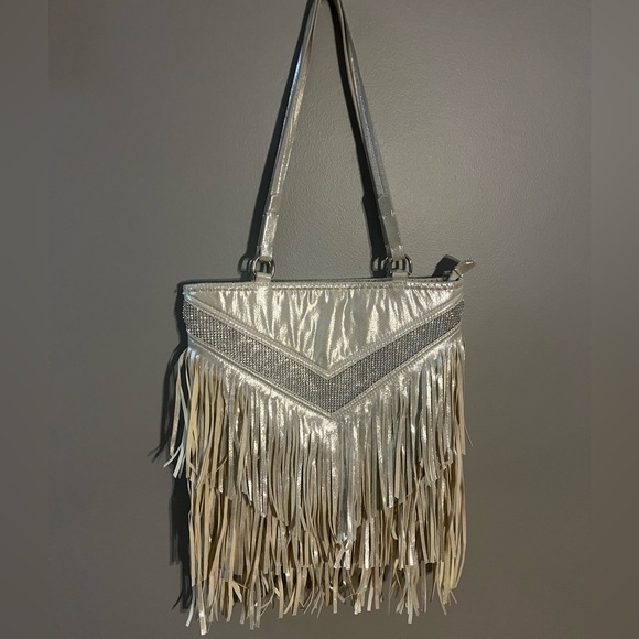 Charming Charlie Handbags - Charming Charlie Purse Rhinestone Fringe Metallic
Shimmering pearl Western Bag